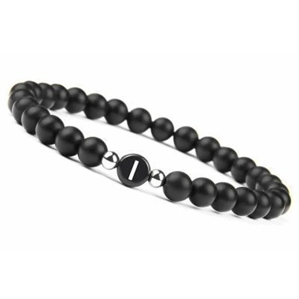 Pulsera negra inicial i