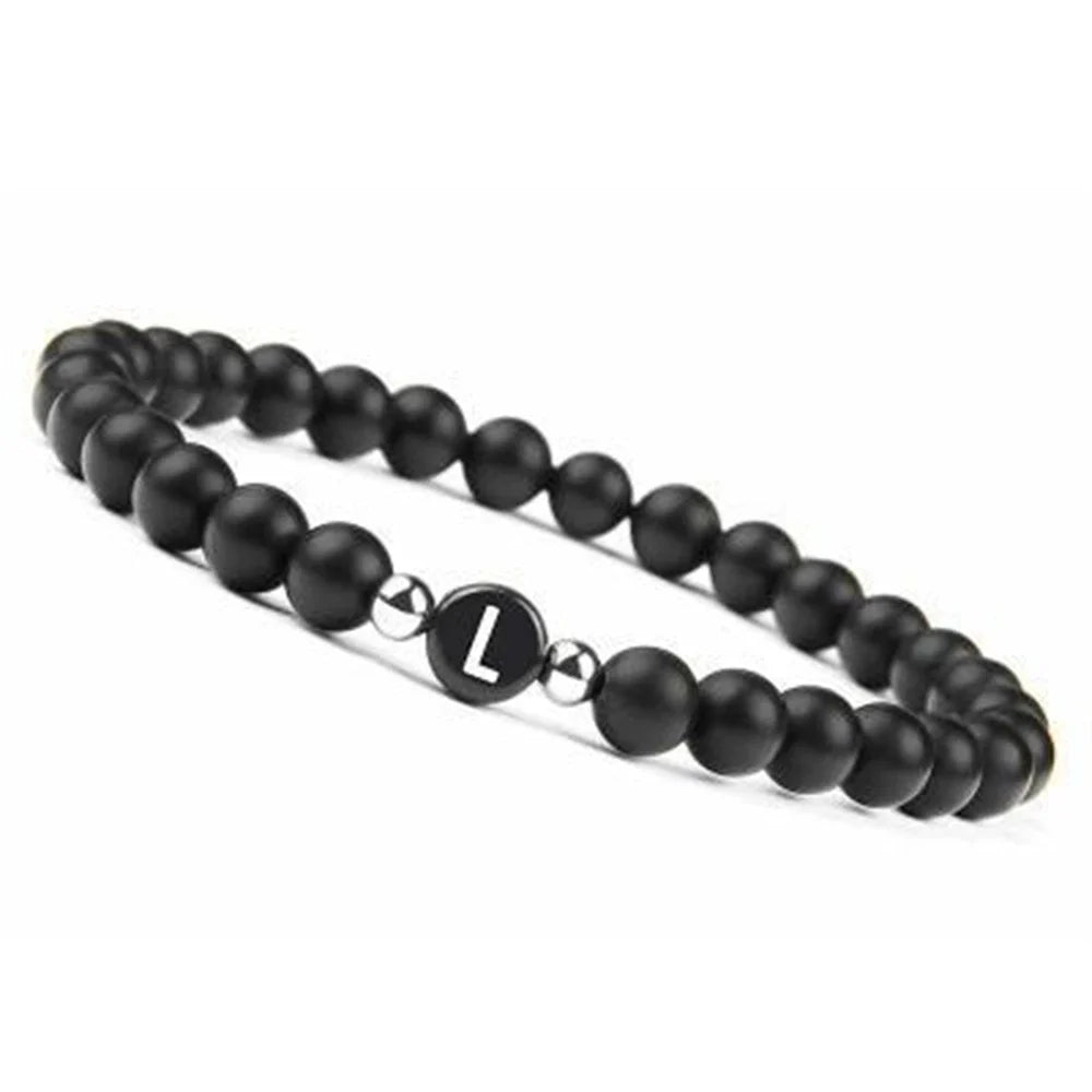 Pulsera negra inicial l