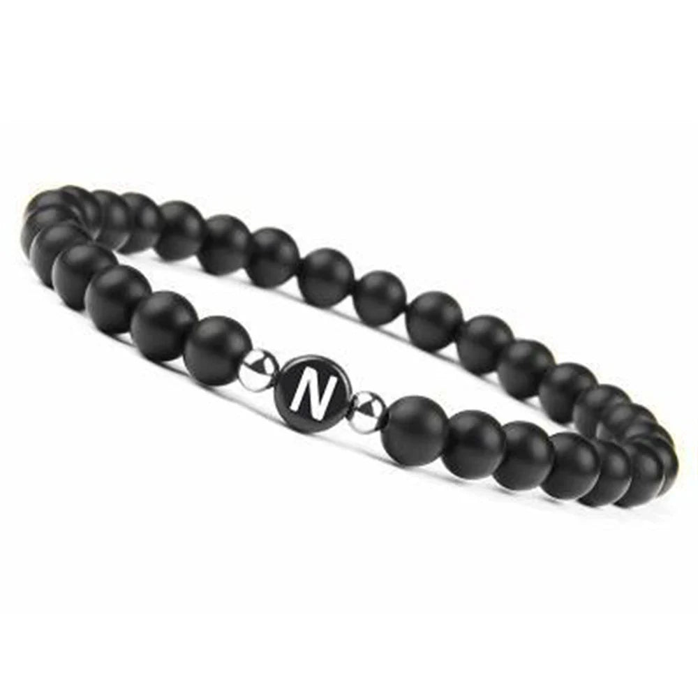 Pulsera negra inicial n