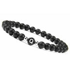 Pulsera negra inicial q