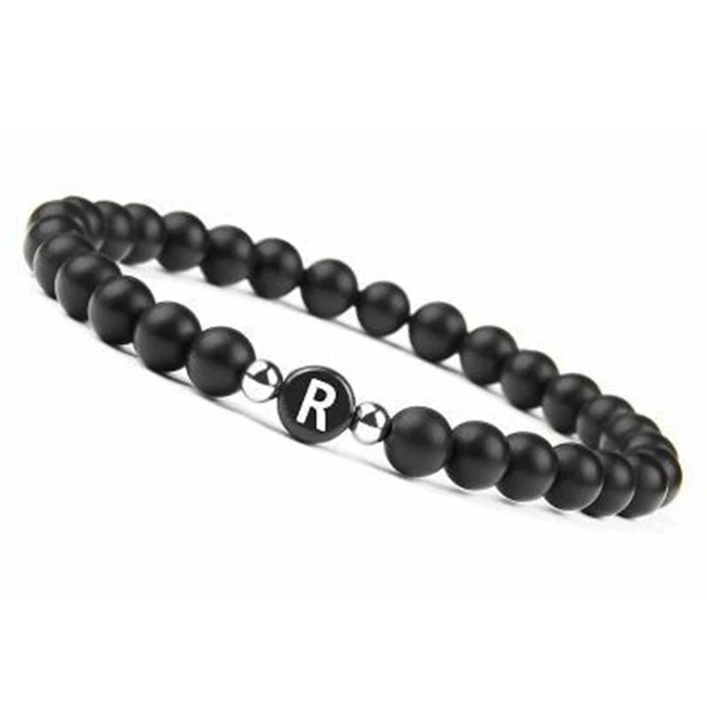 Pulsera negra inicial r