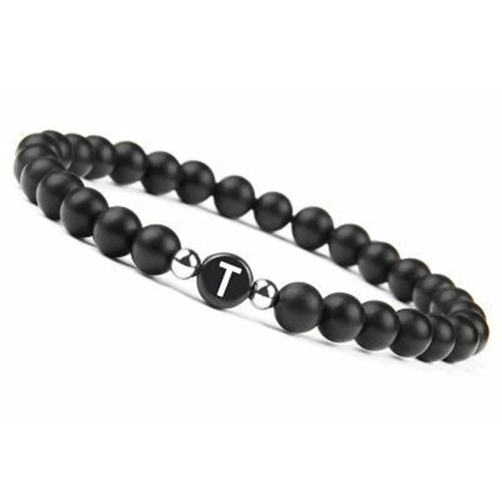 Pulsera negra inicial t