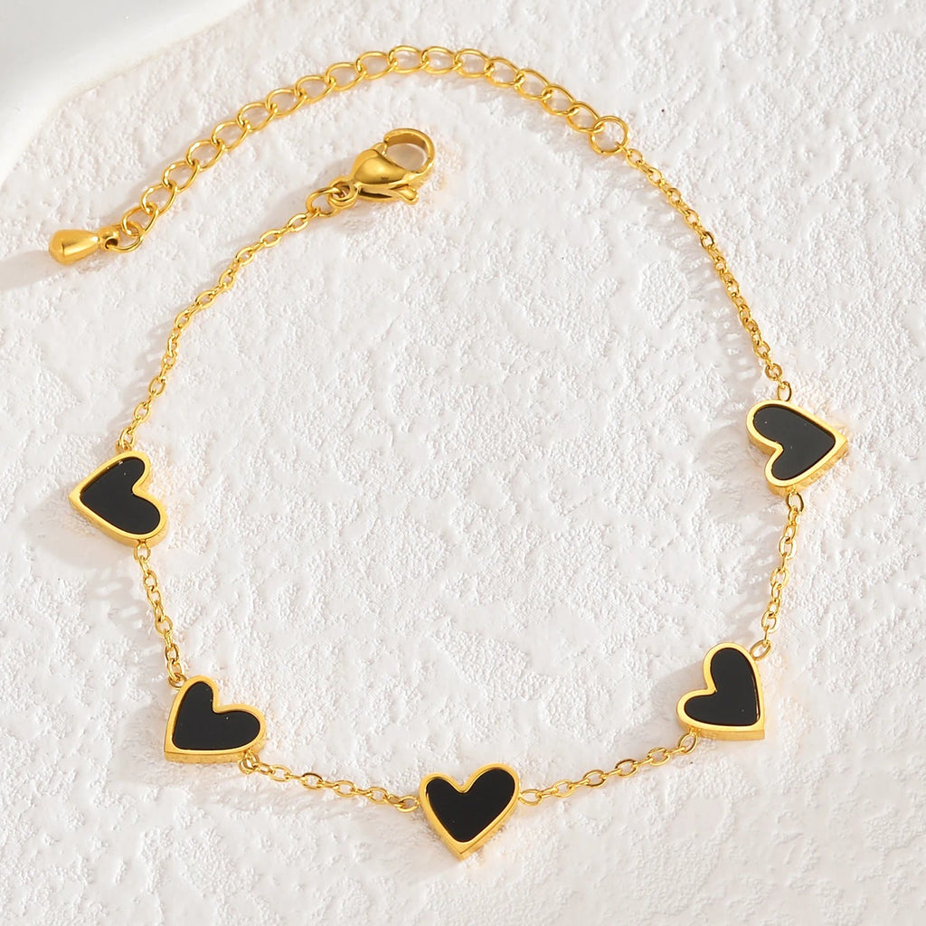Pulsera muestrario de corazones negra