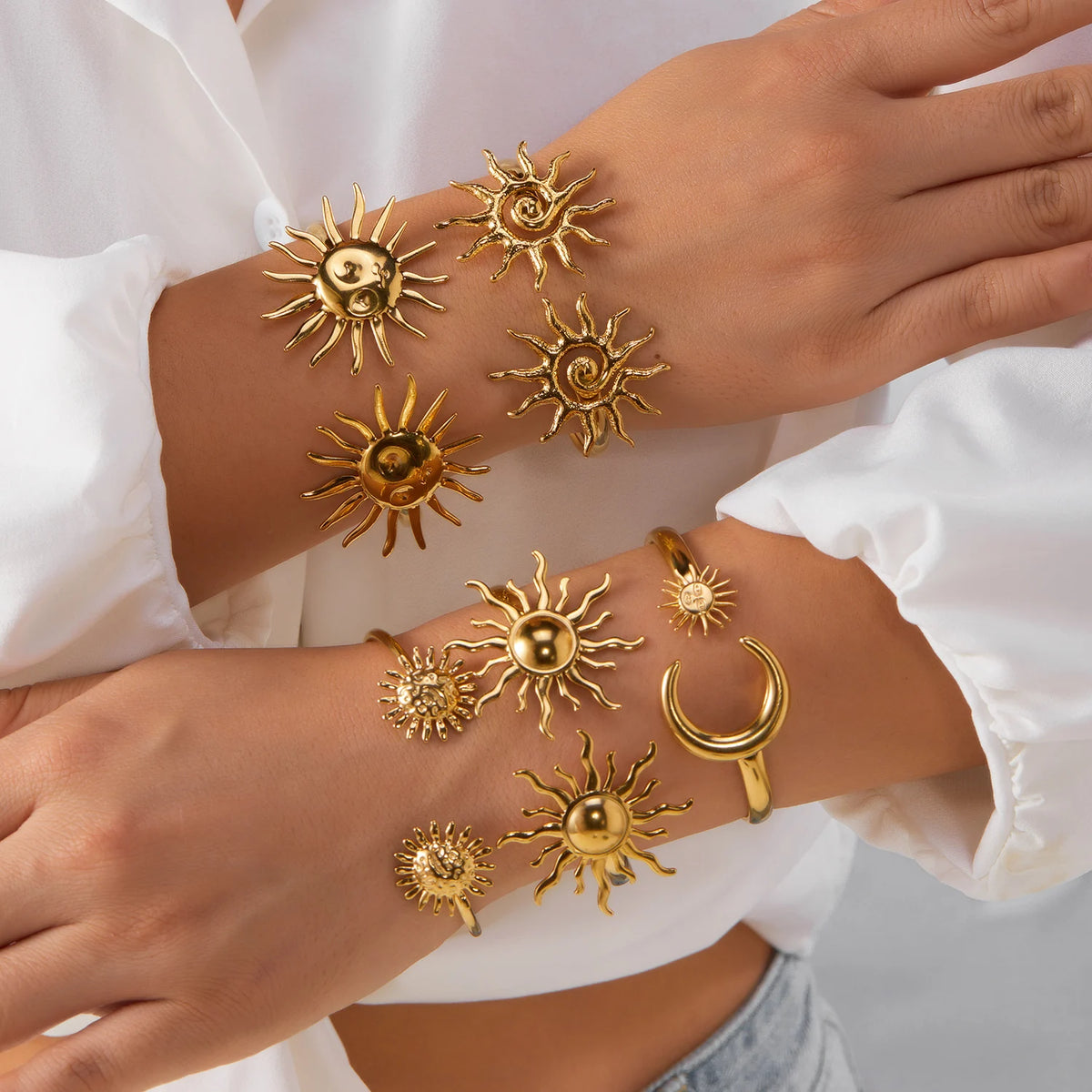 Bracelet ouvert deux soleils à spirale doré