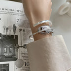 Pulsera de pluma plateada para mujer