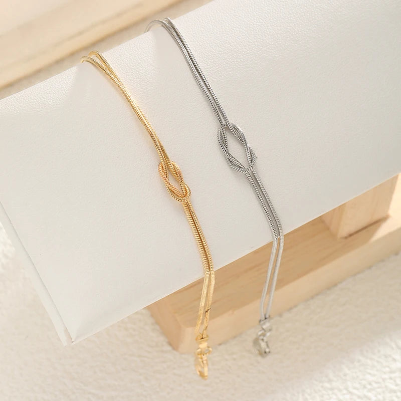 Pulsera para Pareja Nudo Entretejido Oro y Plata (Juego de 2 Pulseras)