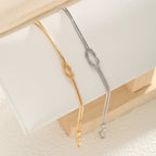 Pulsera para Pareja Nudo Entretejido Oro y Plata (Juego de 2 Pulseras)