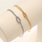 Pulsera para Pareja Nudo Entretejido Oro y Plata (Juego de 2 Pulseras)