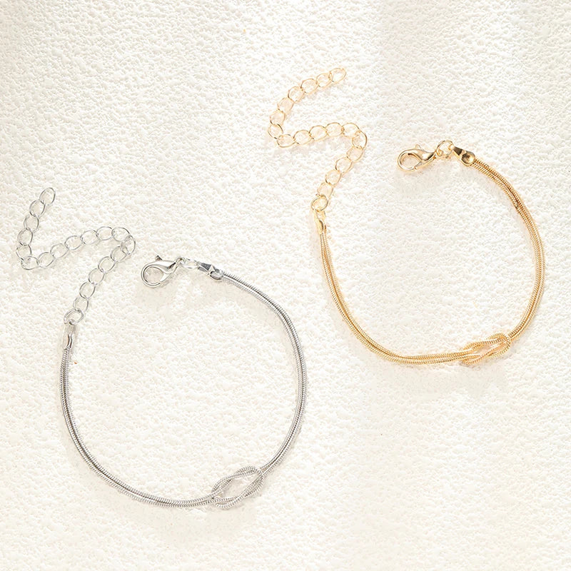 Pulsera para Pareja Nudo Entretejido Oro y Plata (Juego de 2 Pulseras)