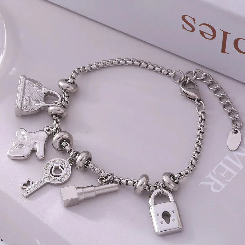 Pulsera de mujer con llaves y candados de plata