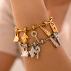 Pulsera de mujer con llaves y candados de plata