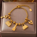 Pulsera de mujer con llaves y candados de oro