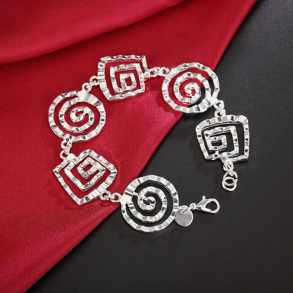 Pulsera espiral plateada para mujer