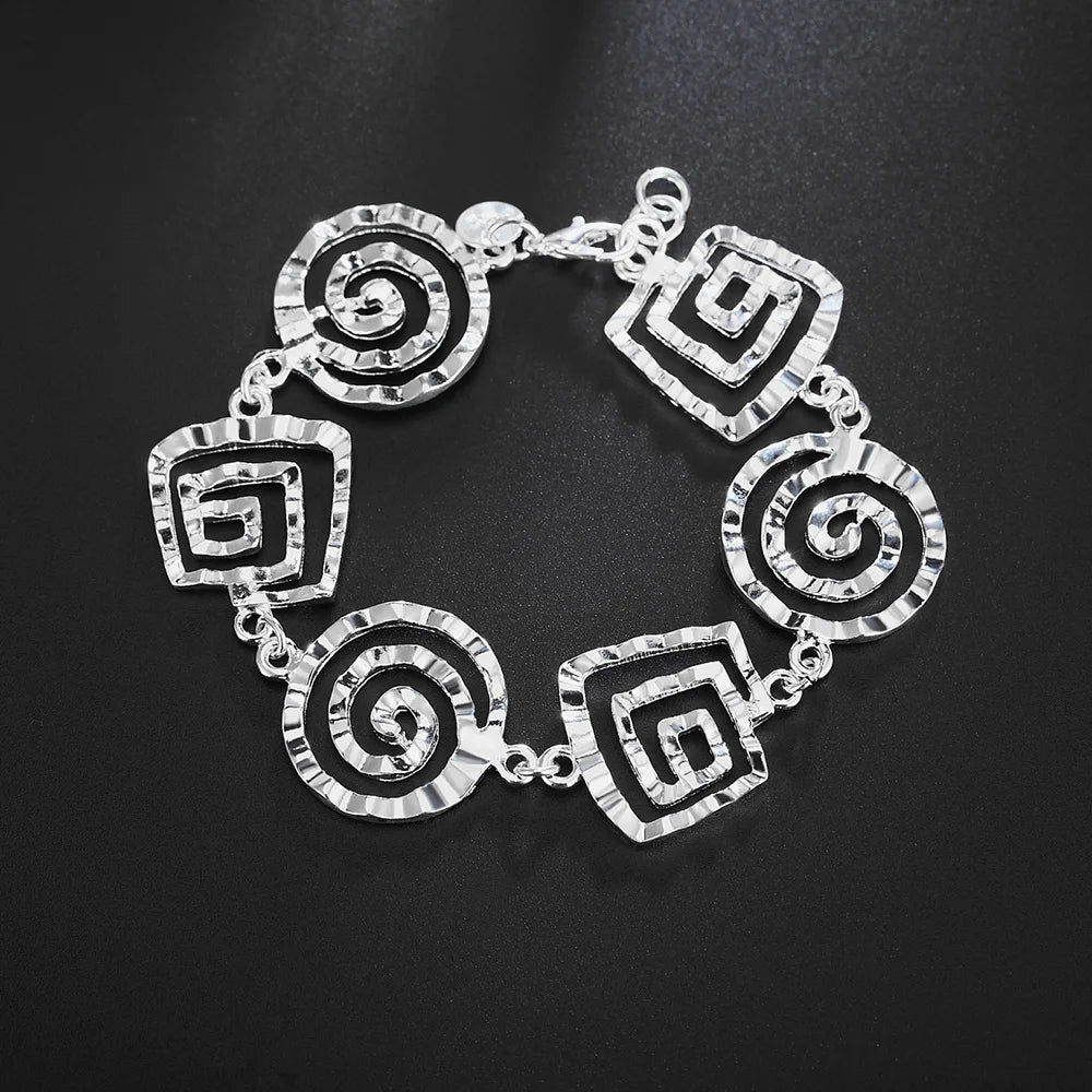 Pulsera espiral plateada para mujer