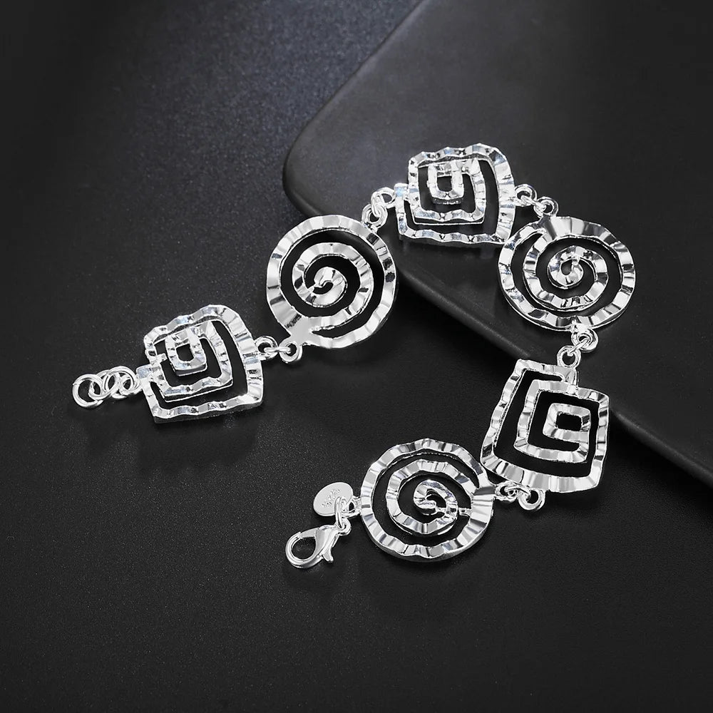 Pulsera espiral plateada para mujer