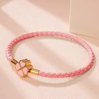 Pulsera Trenzada de Cuero con Trébol de 4 Hojas rosa