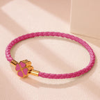 Pulsera Trenzada de Cuero con Trébol de 4 Hojas rosa oscuro