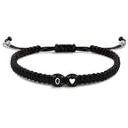 Pulsera trenzada inicial o
