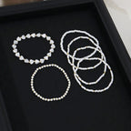 Pulseras de Perlas y Corazones