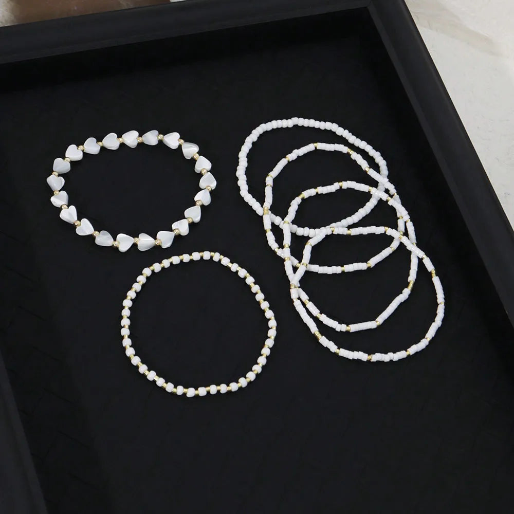 Pulseras de Perlas y Corazones