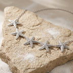 Cadena de cadera estrella de mar - joya para cintura y vientre para mujer plateada
