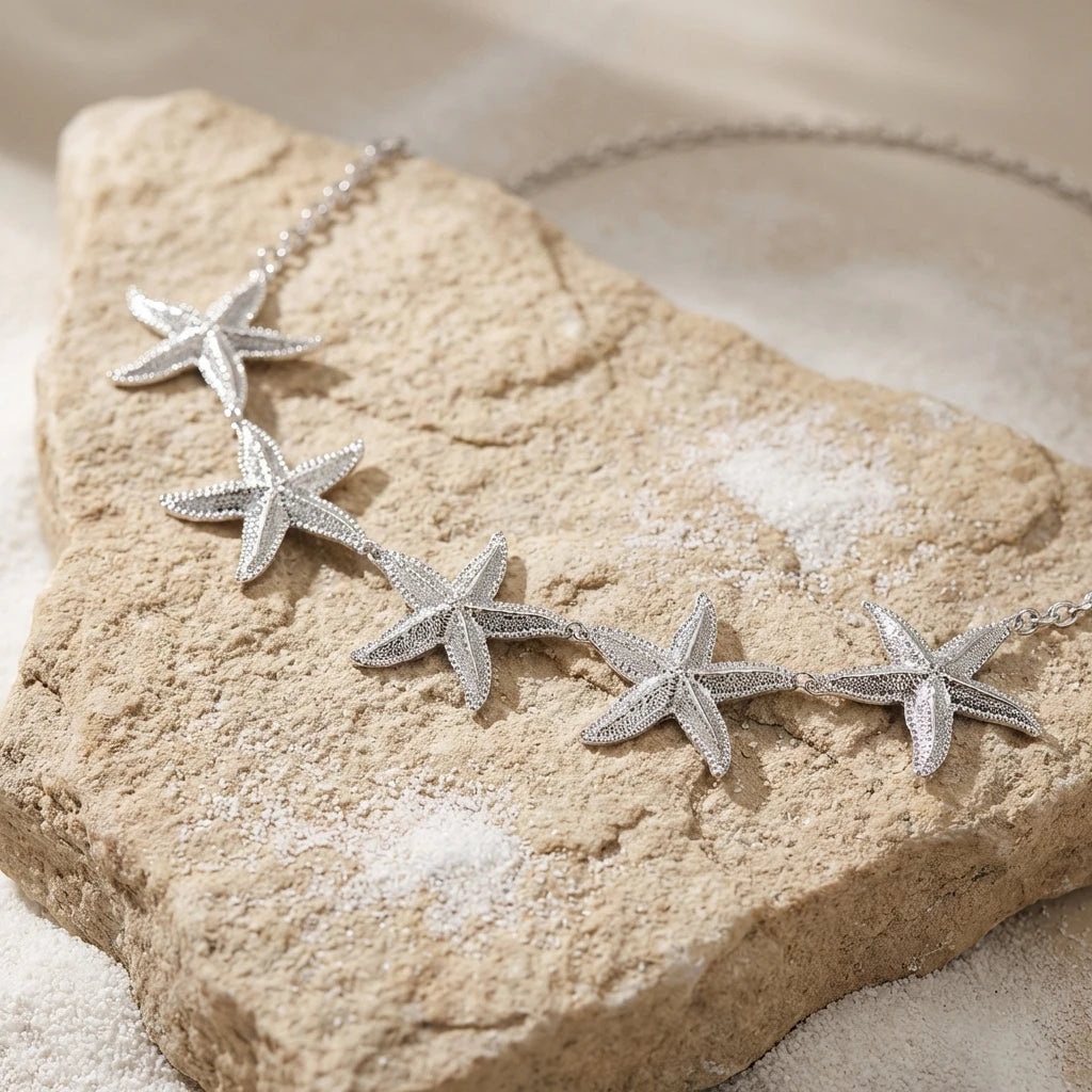 Cadena de cadera estrella de mar - joya para cintura y vientre para mujer plateada