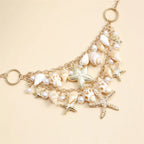 Collar con gran colgante de conchas y estrellas de mar