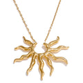 Collier avec grand pendentif demi-soleil aux rayons ondulés or