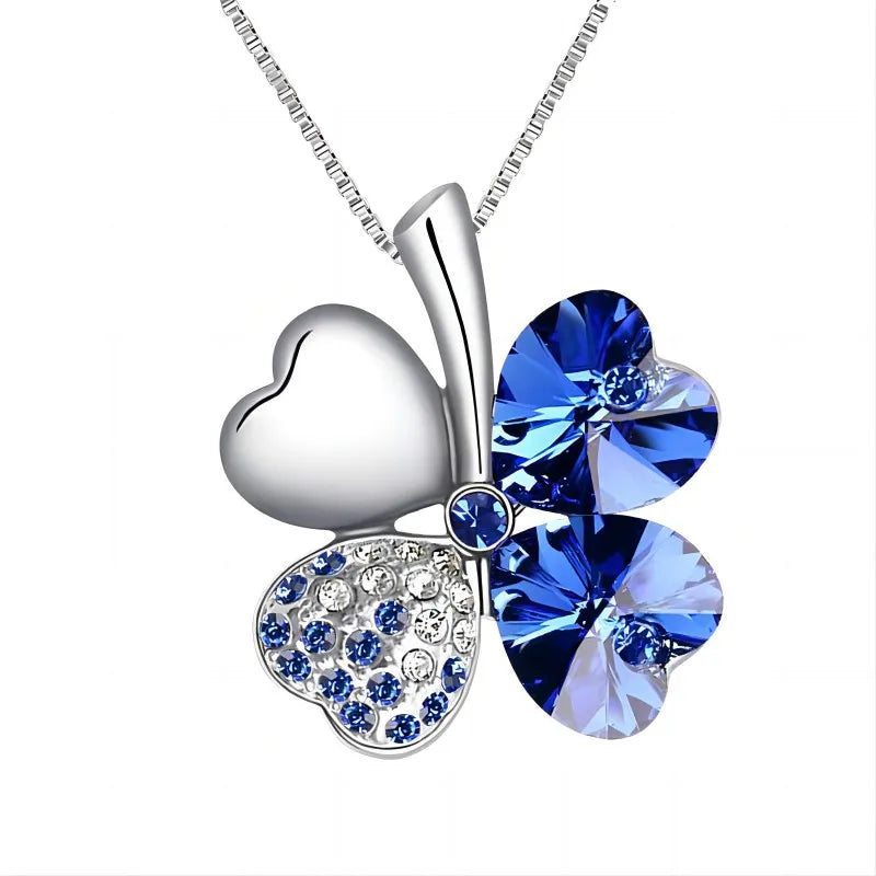 Collar con gran colgante de trébol de cuatro corazones en cristales de colores azul oscuro