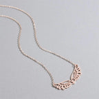 Collar con gran colgante alas de ángel oro rosa