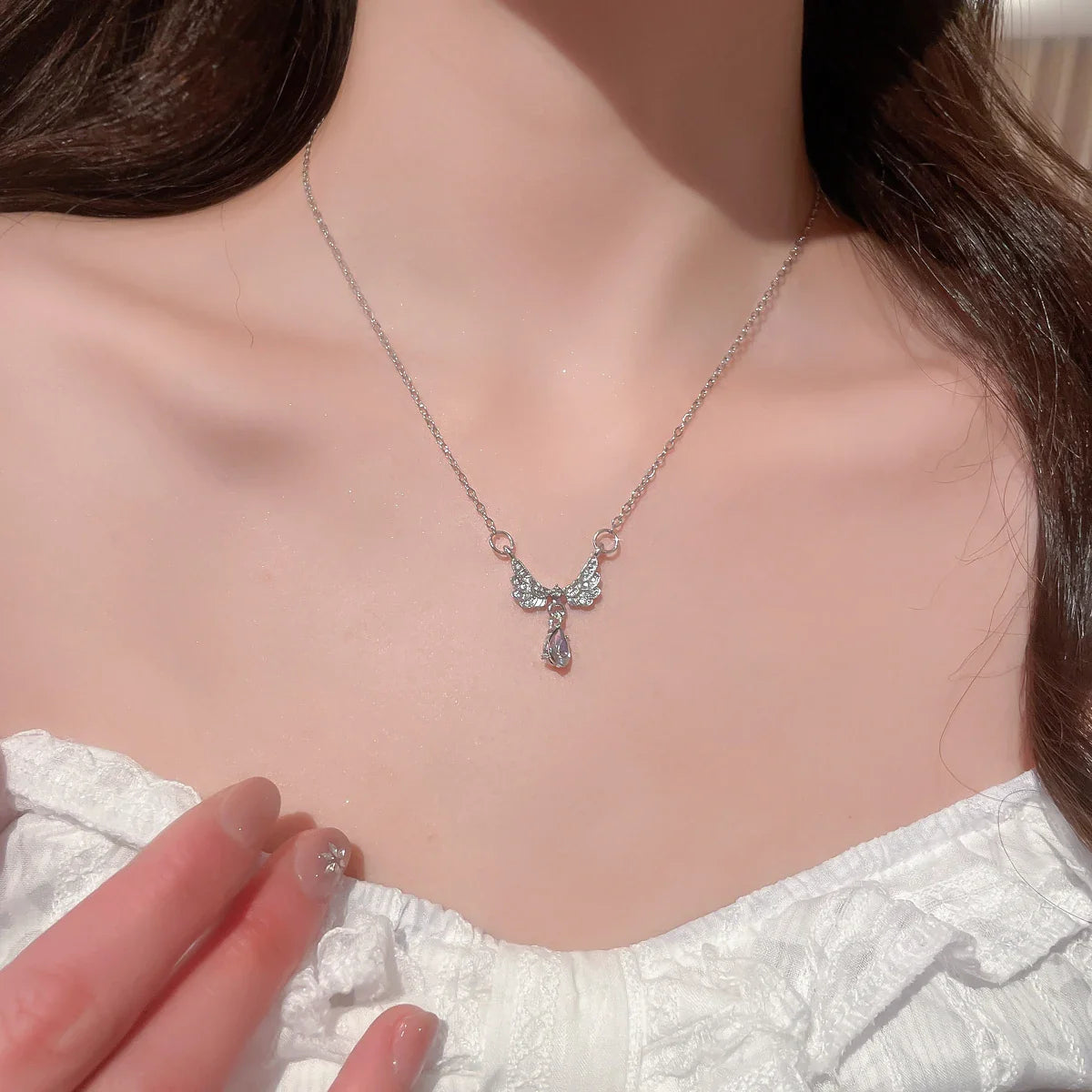Collar con colgante de alas de ángel