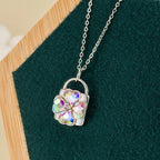 Collar con colgante de candado de trébol de cuatro hojas brillante