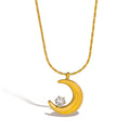 Necklace with crescent moon pendant and lying solitaire star gold