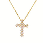 Collar con colgante de cruz con cristales dorados