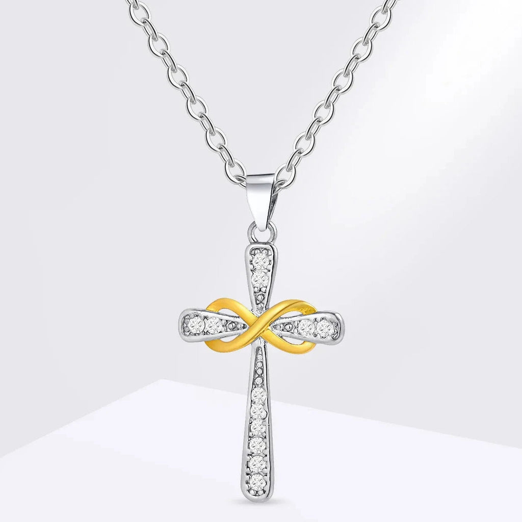 Necklace with two-tone cross and infinity symbol pendant