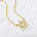 Collar con colgante de la <span data-glossary-id="etoile-de-david">estrella de David</span> en strass símbolo judío