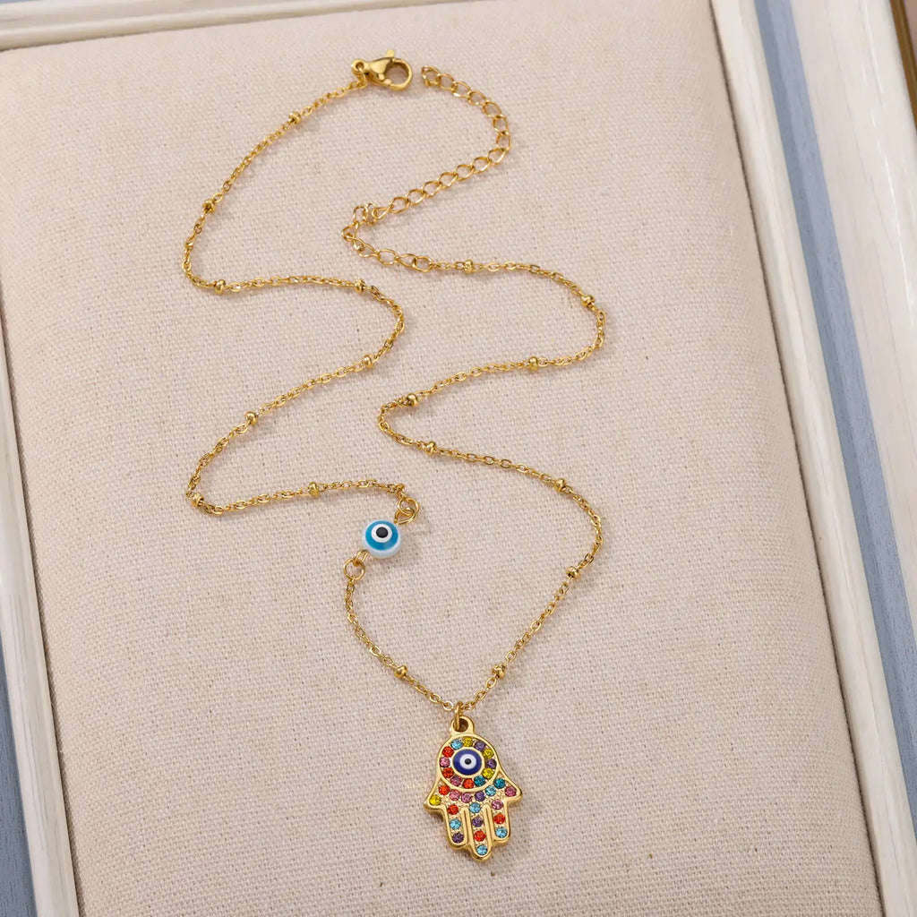 Collar con colgante de protección contra el mal de ojo y mano de Fátima multicolor árabe