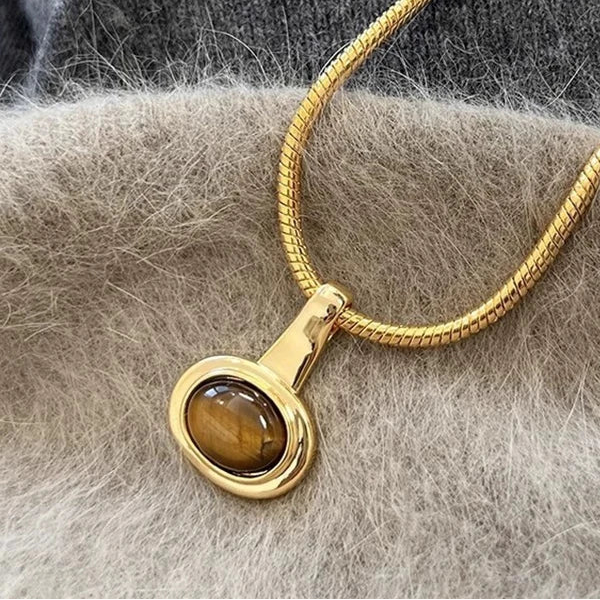 Necklace with oval tiger's eye stone pendant