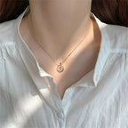 Collar con colgante de flor de rosa dorada