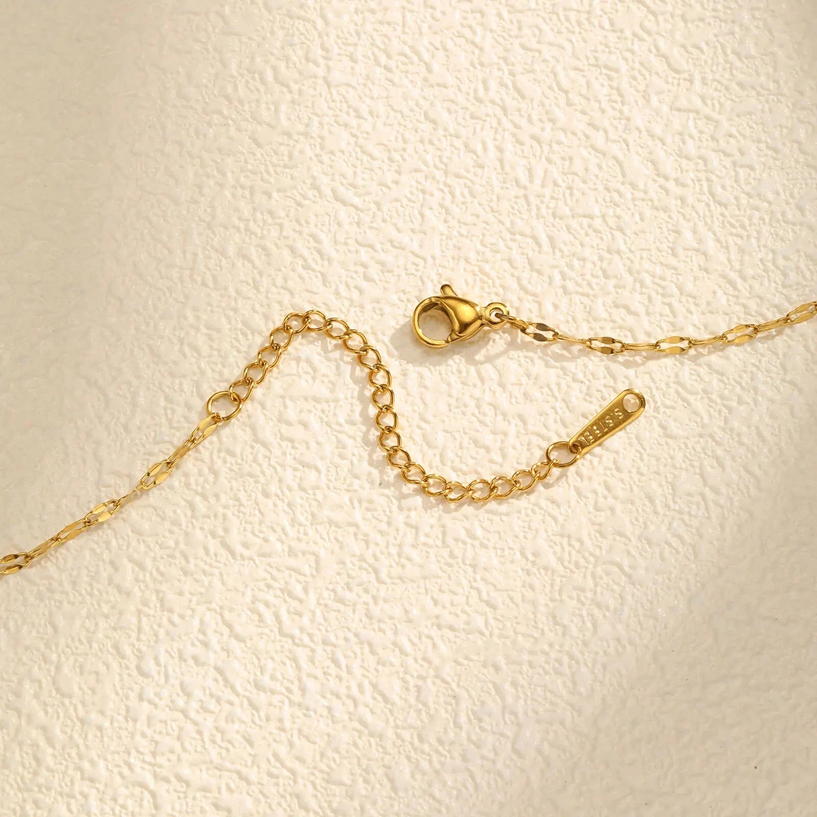 Collar con Colgante de Flor en Circonita Giratoria Antiestrés