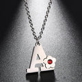 Collar con colgante de inicial y flor 
