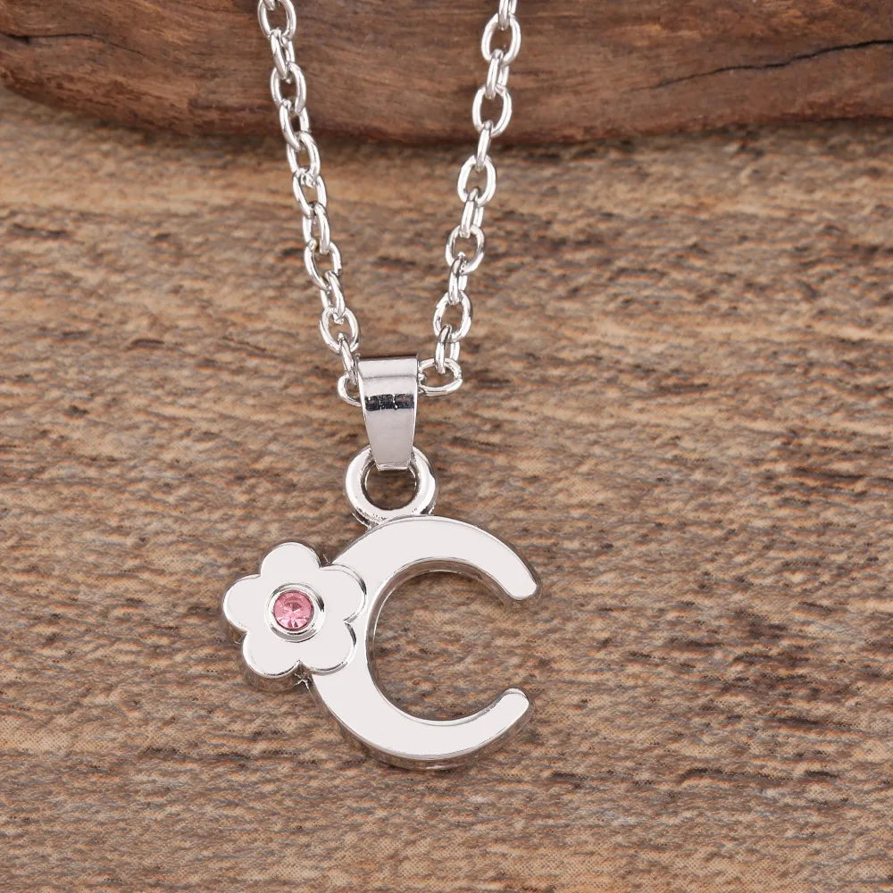 Collar con colgante de inicial y flor c