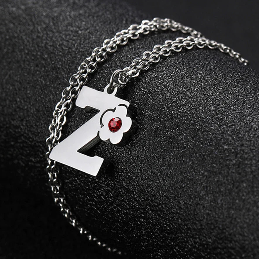 Collar con colgante de inicial y flor z