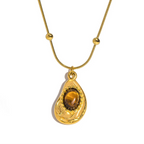 Necklace with teardrop pendant in natural tiger's eye stone