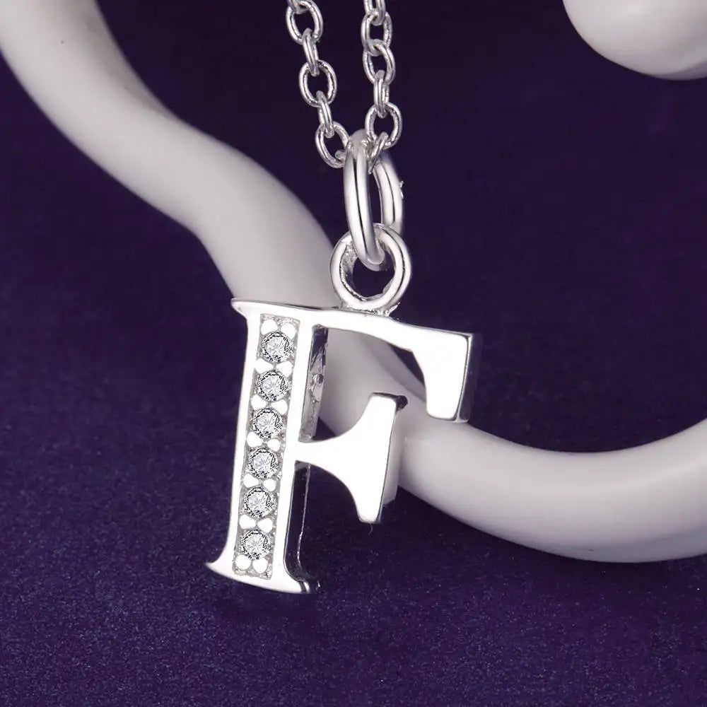 Collar largo con colgante inicial f