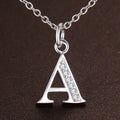 Collar largo con colgante inicial a