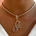Collar gargantilla con colgante de inicial y strass a