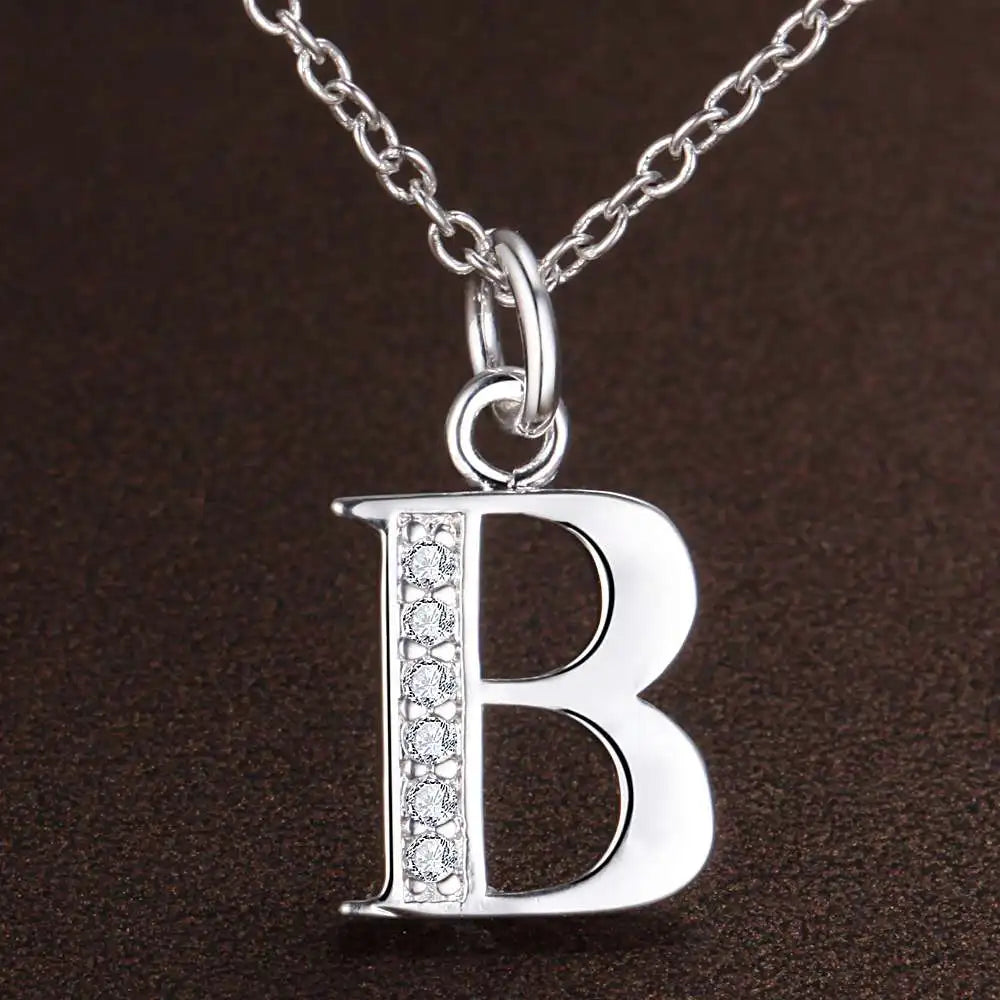 Collar largo con colgante inicial b