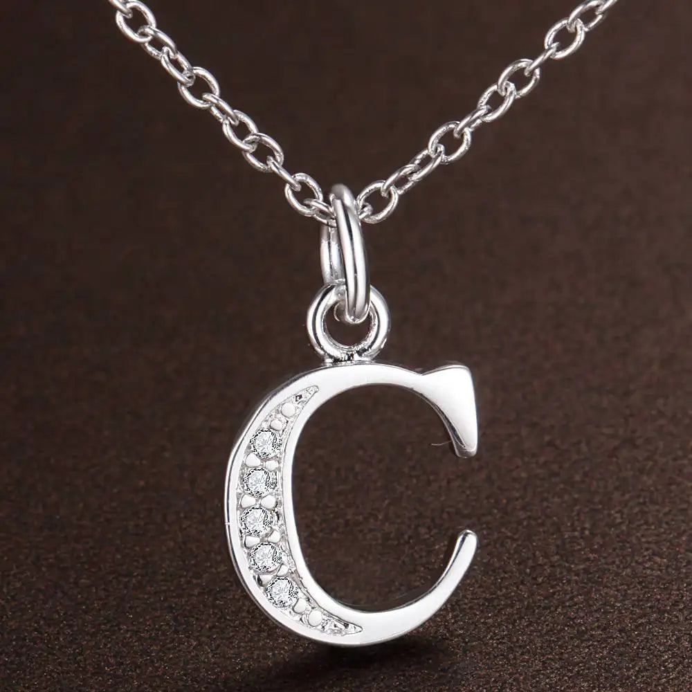 Collar largo con colgante inicial c