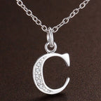 Collar largo con colgante inicial c